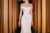 26 a sophisticated silk off the shoulder wedding dress with a draped neckline, a corset and a skirt with a train is jaw-dropping