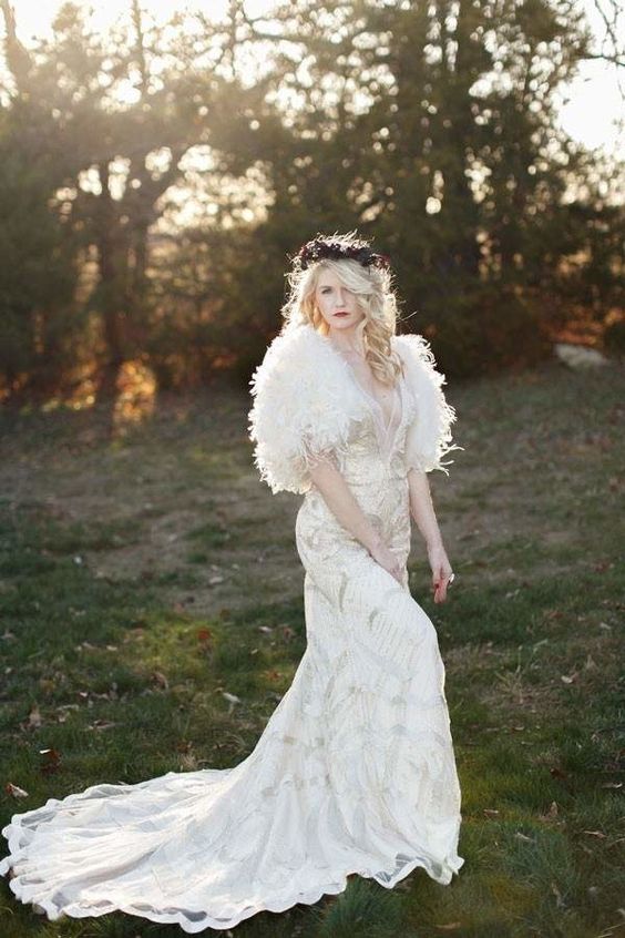 an ostrich feather bridal cover up will be a fantastic solution for a chic and glam bridal look, it will keep you warm