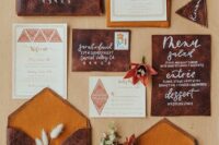 29 a western wedding invitation suite with brown leather envelopes, printed cards, mustard ribbon and calligraphy is wow