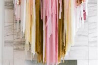 32 a lovely pink, white, gold and yellow streamer wedding backdrop can be hung anywhere you need it