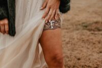 34 a leather monogram western bridal garter is a creative accessory, especially if you have a thigh high slit on your wedding dress