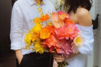 39 a colorful modern wedding bouquet of yellow and pink roses, orange poppies, peachy anthurium and yellow blooming branches