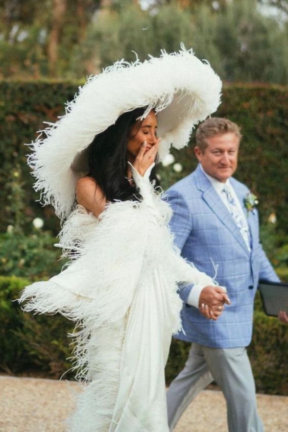 an oversized bridal hat looks great