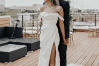 42 a pretty modern off the shoulder mermaid wedding dress with a draped bodice and skirt, a train is classics