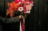 45 a super bold contemporary wedding with white, pink, hot pink and red blooms and bold foliage plus long bright ribbons is wow