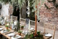 a gogeous woodland wedding tablescape