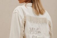 03 a white denim bridal jacket personalized with embroidery and white pearl fringe is a very sophisticated idea