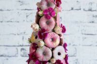 12 a lovely, cute and whimsy pink glazed donut mini wedding cake decorated with yellow and fuchsia blooms for a bold wedding