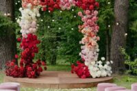 16 a bright color block wedding arch decorated with white, blush, pink and deep red roses is a fantastic color statement