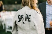 18 a white leather jacket personalized with black letters is a chic and stylish idea to rock at the wedding