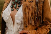19 a brown leather jacket with studs and long fringe is a perfect idea for a boho or western bride, get one for your wedding
