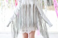 22 a white leather bridal jacket with super long fringe on the back and sleeves is amazing for a modern boho bride