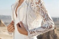 30 a plain plunging neckline wedding dress with a boho lace moto jacket as as an accessory than a cover up are a cool combo
