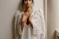 33 a sophisticated white boho lace cropped jacket with catchy shoulders is a lovely idea for a wedding