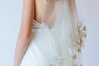 a sheer veil with gold crystals and sequins covering the edge is a super chic and glam idea for a modern bride