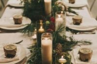 05 a fir table runner, pinecones, floating and usual candles for a wintery or Christmas wedding table