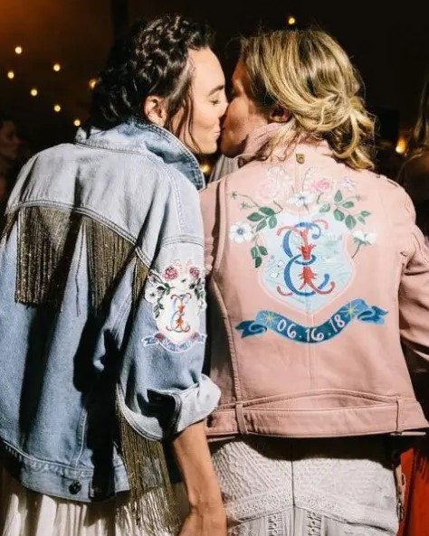 personalized bridal jackets – a blue applique denim one with long gold fringe and a pink leather one with handpainting
