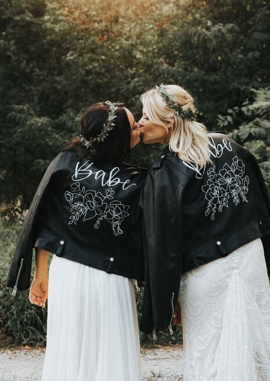 customized black leather jackets for both brides are a cool way to pull off a unifying touch