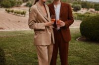 21 a rust-colored pantsuit, a white shirt and black shoes can be a nice solution for a fall wedding and is good for other seasons, too