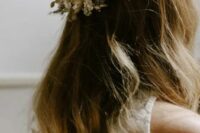 a beautiful and delicate dried flower and foliage crown in white is an amazing accessory for a boho wedding