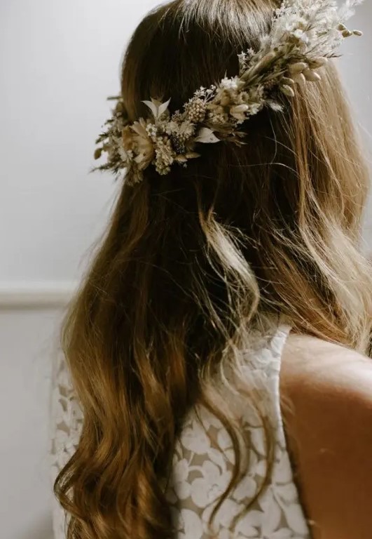 a beautiful and delicate dried flower and foliage crown in white is an amazing accessory for a boho wedding