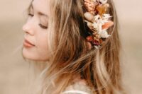 a beautiful rust and neutral fall bridal crown with leaves and some blooms is a cool idea for a fall wedding