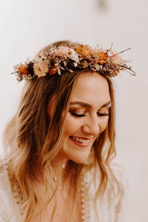 a lovely dried flower crown with neutral, rust and burgundy blooms and some twigs is a stylish and catchy idea