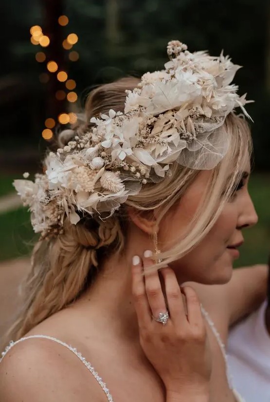 a neutral dried flower crown with leaves, blooms and berries, with silk leaves is a lovely idea for a neutral boho bride