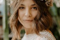 a super cool and textural dried flower crown with leaves and herbs is a catchy and cool idea for a boho or rustic bride