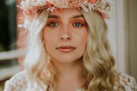 a super cool dried flower crown in white and pink that matches the bridal pink smokey eye is a cool idea for spring or summer