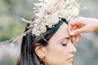 an inspiring dimensional white dried flower bridal crown is a lovely idea for a spring or summer bride