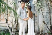 02 a beautiful and comfortable plain mermaid wedding dress with spaghetti straps and a deep cutout back plus a train is amazing for a summer wedding