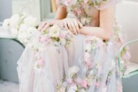 02 a beautiful off the shoulder semi-sheer wedding dress with pink and neutral floral applique and beading is amazing for spring