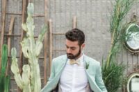 a pastel groom’s suit is perfect for a spring wedding
