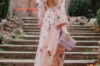 a cool wedding guest look in a floral dress