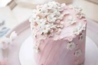 08 a delicate light pink wedding cake with fresh cherry blossom is an ideal solution for a spring wedding, it looks amazing