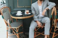 08 a grey linen thin stripe suit, a white t-shirt and black sneakers for a relaxed and informal summer wedding