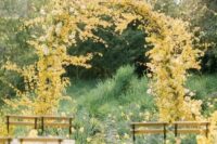 10 a fantastic yellow wedding arch covered with yellow blooms and blooming branches is a gorgeous idea for summer and fall