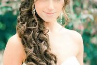 10 a gorgeous side-swept ponytail with curls and face-framing locks plus a volume on top for a bride with long hair