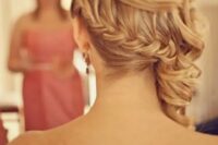 12 a half updo with a braided ponytail and waves on top is a unique and versatile hairstyle