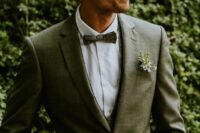 12 an olive green three-piece pantsuit with a white shirt and a green printed bow tie are a lovely combo for a wedding