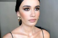 12 stylish bridal makeup with a glossy nude lip, a touch of blush and brown smokey eyes plus matte skin is cool