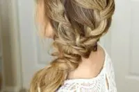 15 a low braided ponytail made up of several braids plus a halo is a relaxed idea for a rustic or boho wedding