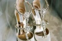 15 creamy strappy heavily embellished wedding shoes are a bold and shiny option that will fit most of bridal looks