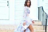 19 a dreamy pastel floral maxi dress with a thigh high slit, long sleeves and lace inserts plus bold blue shoes and a white box clutch