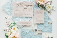 20 a lovely pasel blue wedding invitation suite with white floral prints and rough edge pieces is super cool