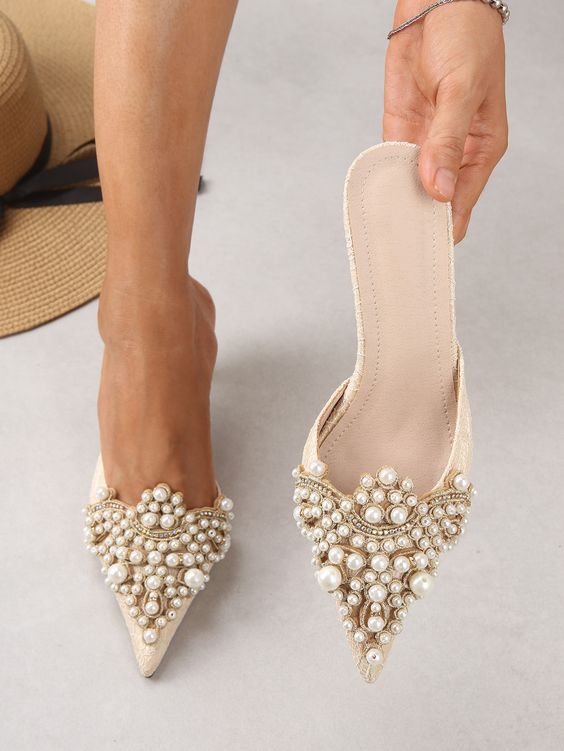 sophisticated neutral heavily embellished wedding mules with pearls and gold details are an amazing idea to spruce up the look