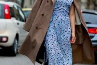22 a fitting blue floral print midi dress, statement earrings and pink shoes, a brown plaid coat are a lovely look for spring