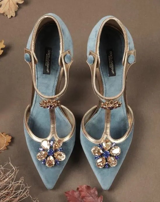 super refined vintage wedding shoes of blue velvet, gold touches and large embellishments for a touch of 'something blue'