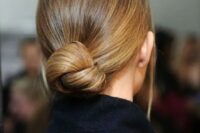 23 a very sleek twisted low bun with no hairpieces for a chic ultra-minimalist bridal look